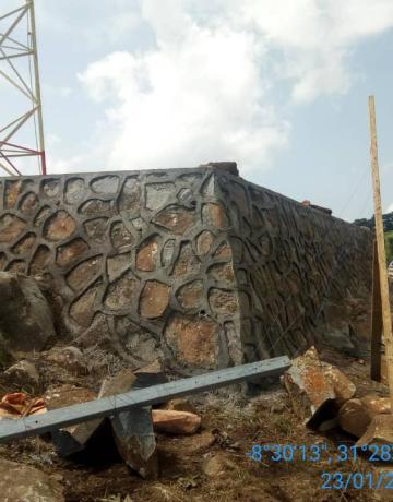Retaining wall construction at Nsopa Telecommunication tower. Retaining wall was constructed in order to stabilize tower foundation and prevent soil erosion. 